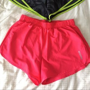 Pink Reebok running shorts